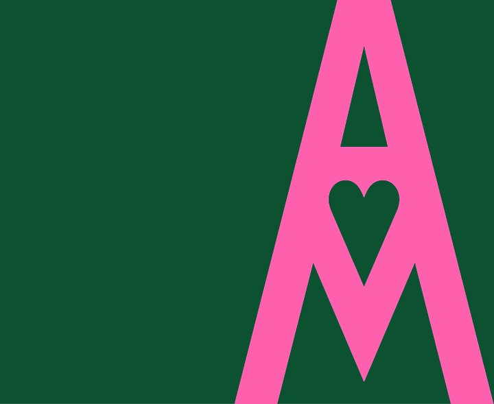 A pink A with a heart in the middle on a green background.