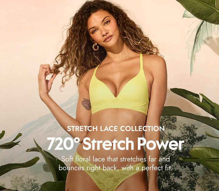 Stretch lace collection from Adore Me. Woman in yellow lace bra and yellow lace panties.