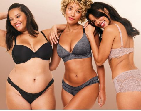 Three women wearing a black bra, a grey bra and a dusty pink bra from Adore Me