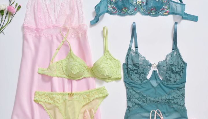 A collection of women's lingerie, including bras, panties, and a nightgown.