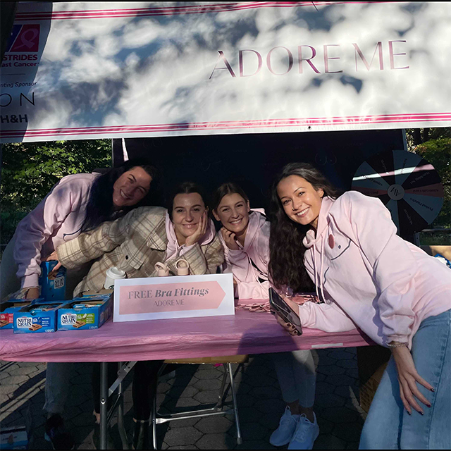 Free bra fittings at Adore Me booth for breast cancer awareness.