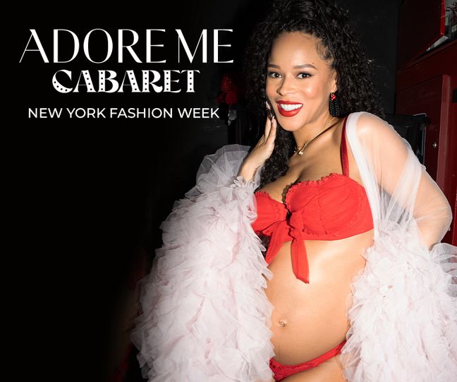 ADORE ME CABARET NEW YORK FASHION WEEK. Pregnant woman poses in red lingerie.